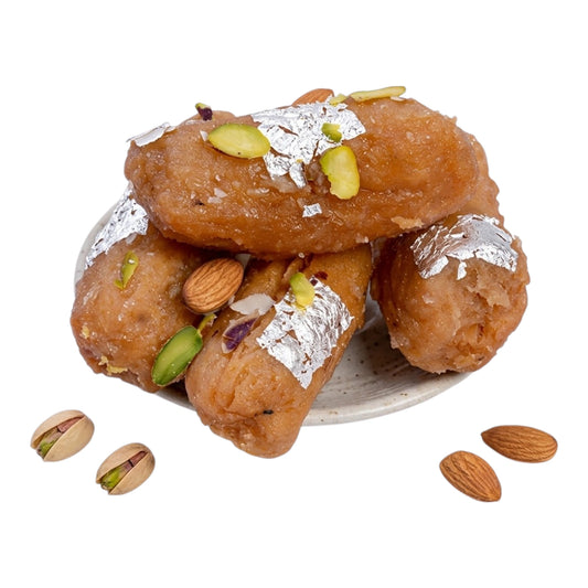 Sindhi Tosha | Fried Sugar Glazed Sweet Rolls Mithai with Pista